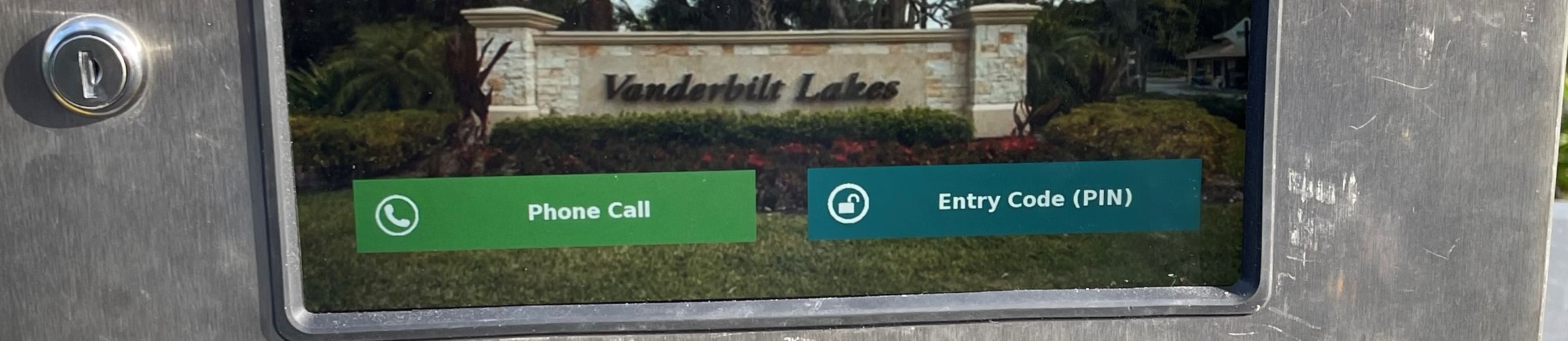 close up of two buttons on call box